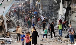 PALESTINOS comeam a retornar a uma GAZA devastada